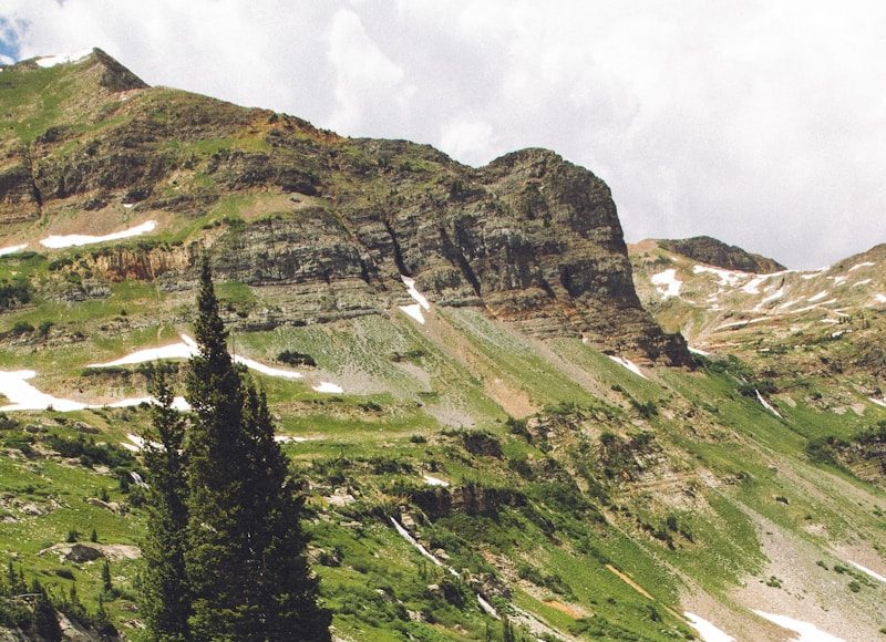 woman walking down the hill at daytime